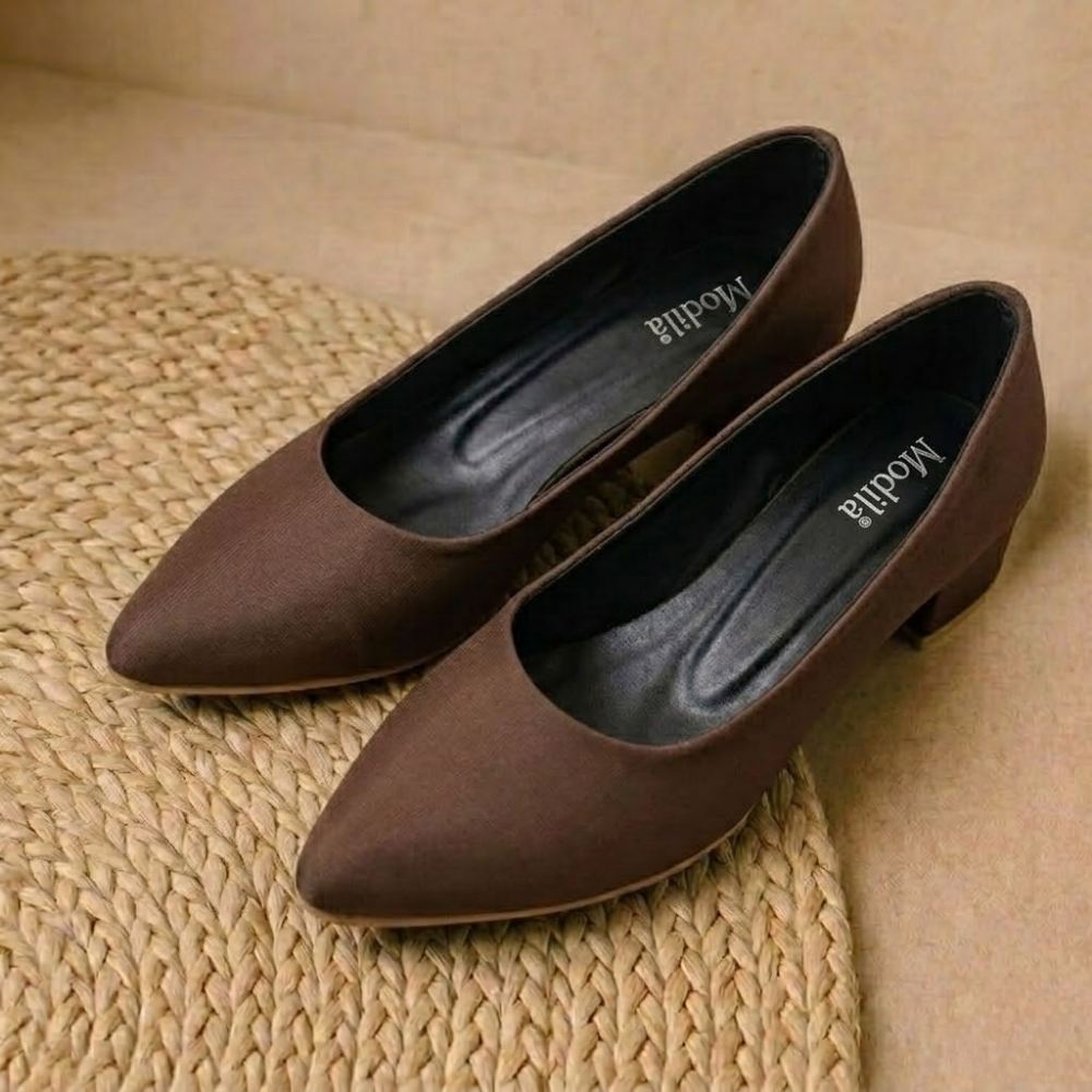 Elara-BROWN
