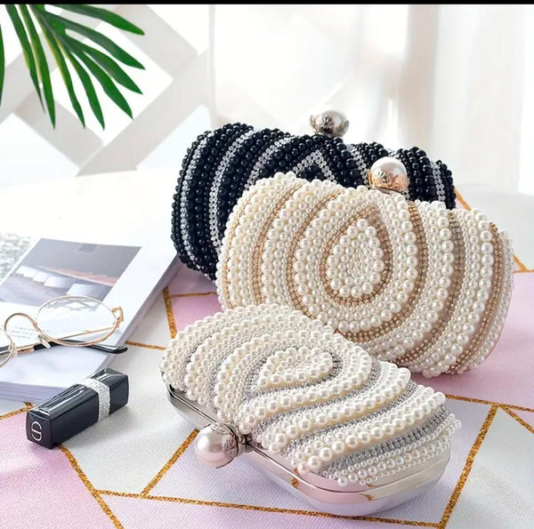 Elegant pearl cluches for party wear