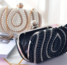 Elegant pearl cluches for party wear