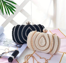 Elegant pearl cluches for party wear